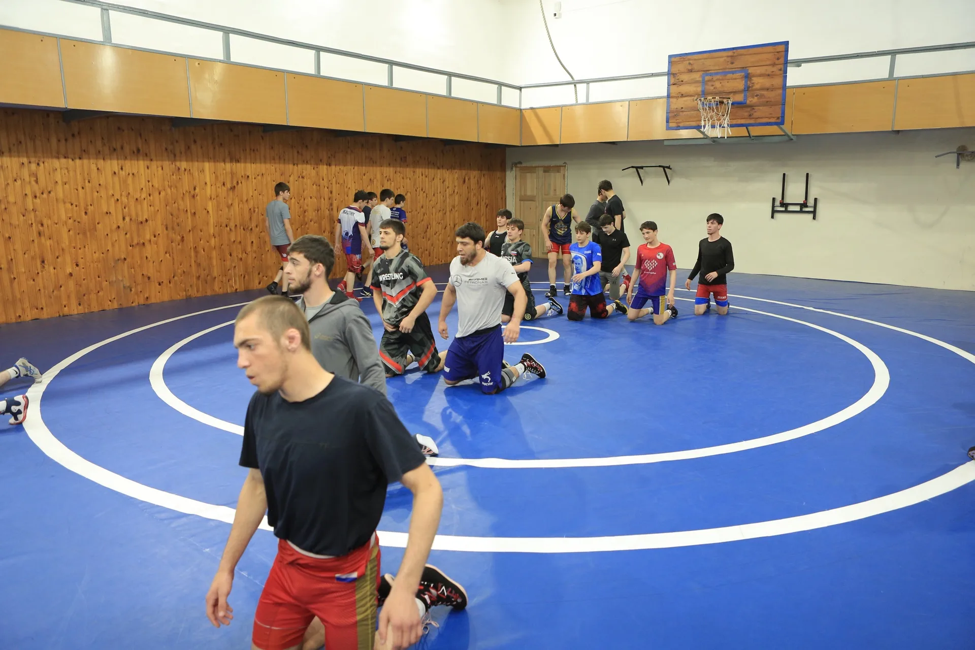 Floor stretching session in the wrestling room in Dagestan
