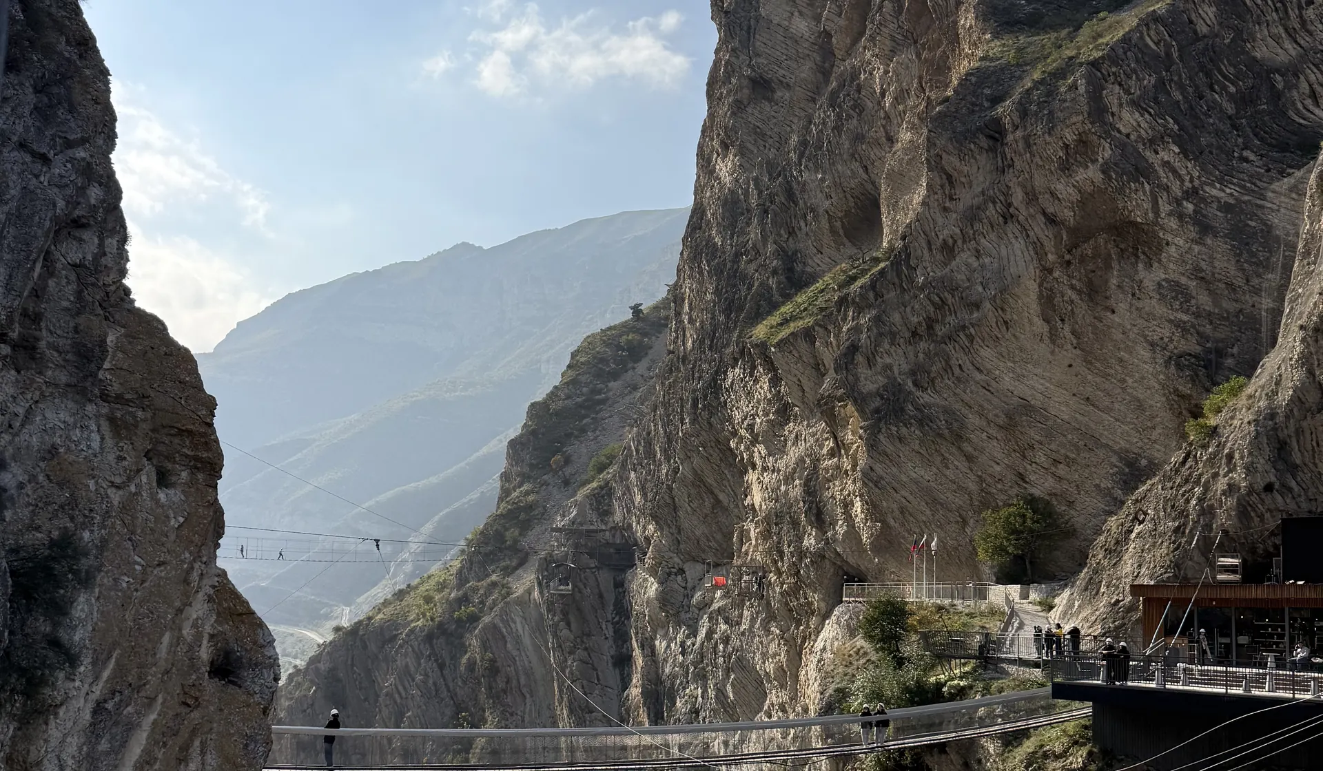Suspension footbridge over the Sulak canyon in Dagestan, between two cliffs